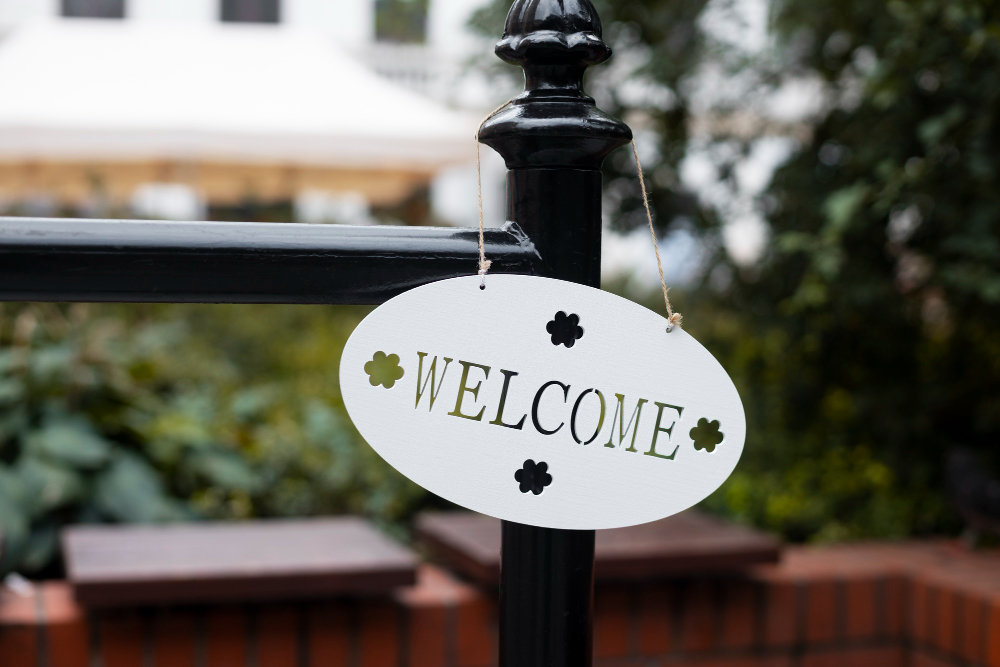 Welcome sign hanging outdoors